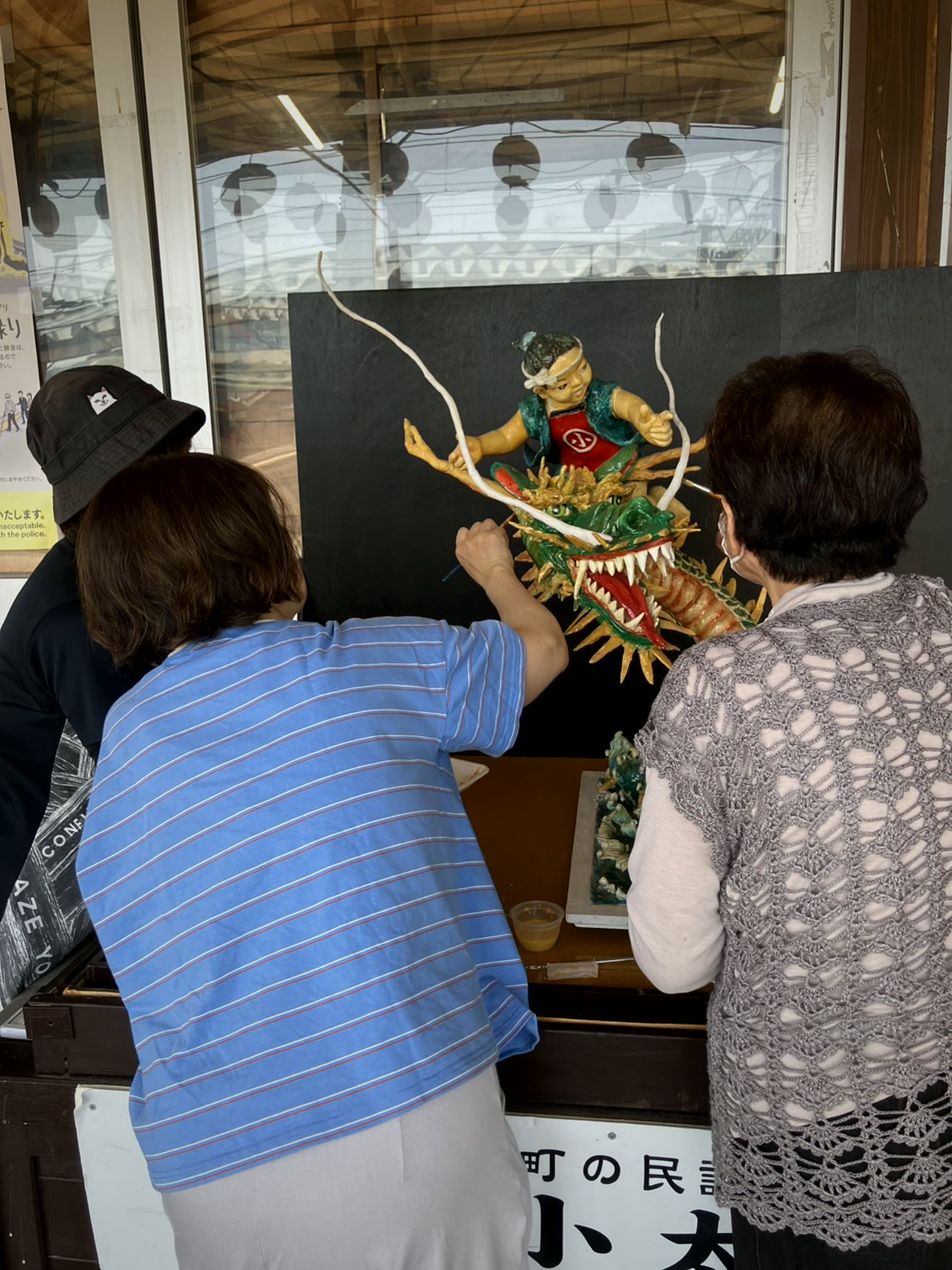 Adjusting Kotaro’s position